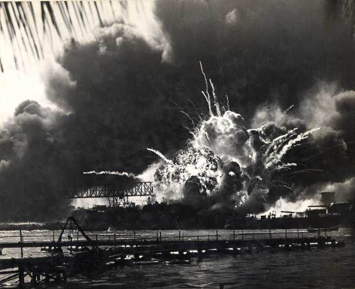 a black and white image of the bombing on pearl harbor